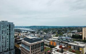 A view of a city from the top of a building